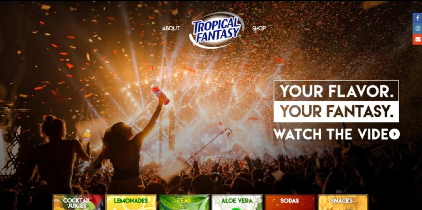 Captura da homepage da Tropical Fantasy — site de marca de bebidas com hero de festival e categorias de produto